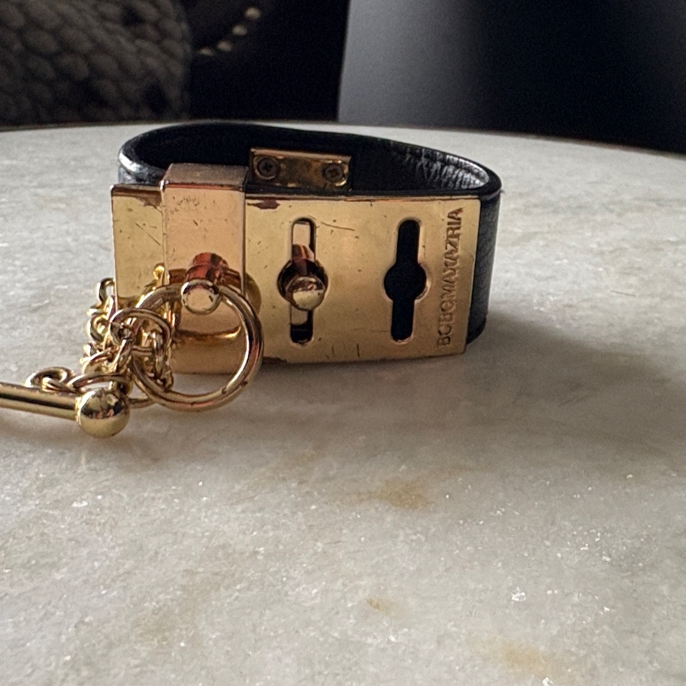 BCBGMaxAzria Gold and Black Lock Charm Bracelet